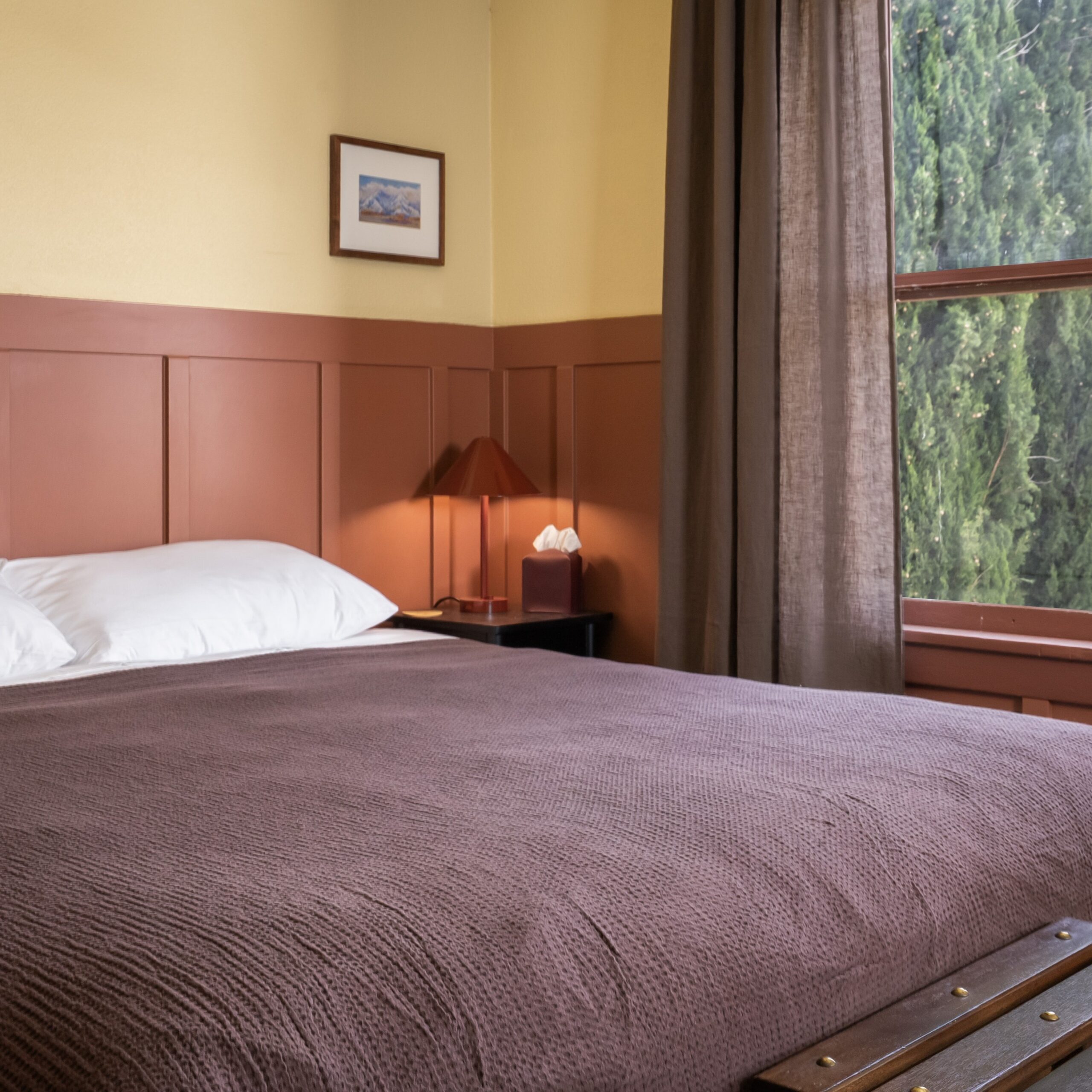 Suite bed with quiet window view